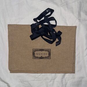 Gucci Beige Pouch with Black Gucci Ribbon